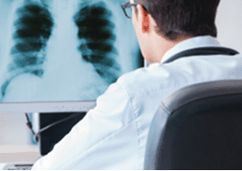 Doctor reviewing patient lung scan