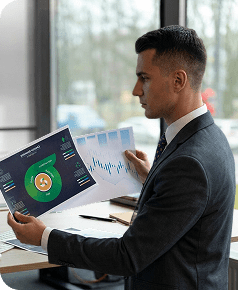 Man reviewing healthcare analytics charts