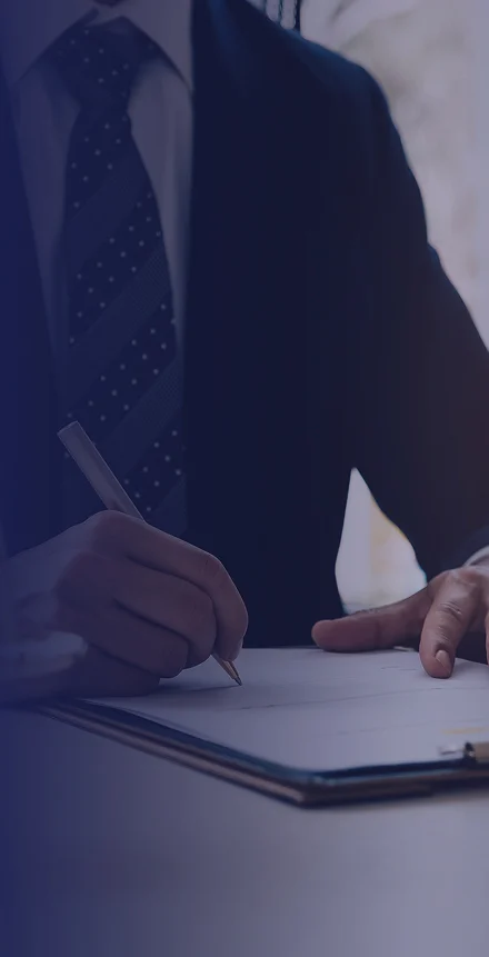 Ged Lawyers corporate executive signing paperwork